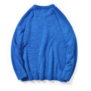 Detailed texture of blue chunky knit sweater fabric with premium chenille finish