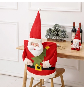 Detail of red and white Santa Claus chair cover fabric in a festive Christmas home setting