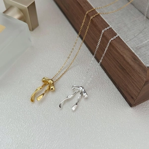 Minimalist 925 sterling silver bow pendant necklace in gold and silver finishes