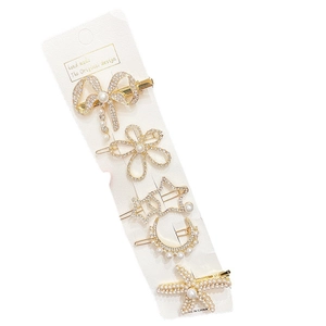 5-piece gold hair clip set with pearls and rhinestones featuring butterfly and star shapes