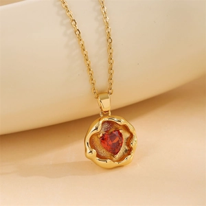 Vintage gold-plated heart necklace with a vibrant red heart-shaped zircon gemstone