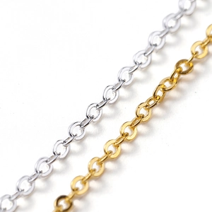 Macro detail of high-quality silver and gold lobster clasp chains for jewelry making