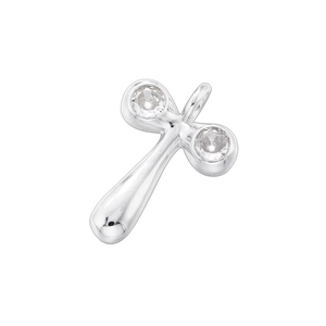 Macro shot of a silver bamboo-style cross pendant with clear cubic zirconia stones