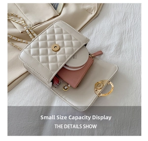 Detailed view of white quilted crossbody bag capacity showing small daily essentials