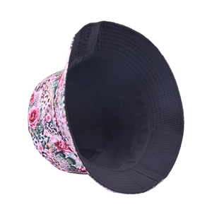 Reversible bucket hat with floral rose and leopard print design on white background