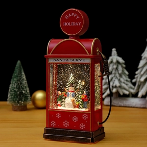 Vintage red gas station snow globe with LED lights and rotating Christmas tree detail