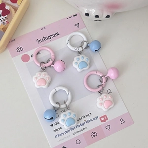 Cute pink and blue cat paw keychains with matching bells and matte rings, 4-piece set