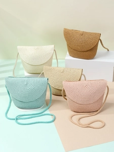 Handmade woven straw crossbody shell bags in pastel macaron colors for summer beach vacation