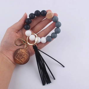 Silicone beaded wristlet keychain with wood bead, MAMA wooden pendant and black leather tassel.
