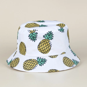 Bob blanc réversible avec imprimé tropical d'ananas pour une protection solaire en plein air