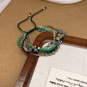 Bohemian multilayer woven bead bracelet with crystal beads and adjustable green cord