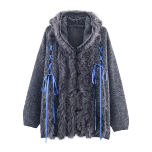 Women's grey knit hoodie with faux fur trim and blue satin ribbon lace-up detail