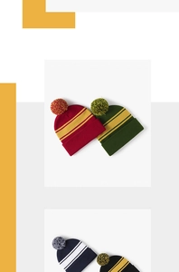 Close-up of four colorful striped knit beanies with matching poms and thick texture