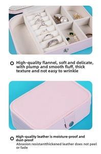 Pink jewelry box detail showing velvet lining and multi-grid storage for rings and earrings