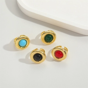 Set of four minimalist gold open rings with turquoise and colorful enamel stones