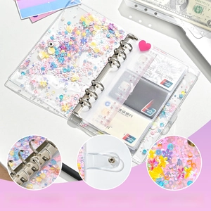 Detail view of A6 glitter PVC binder with 6-ring metal binder and secure snap buckle