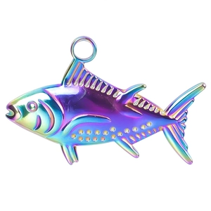 Detailed macro view of a 18k gold plated rainbow fish pendant in stainless steel