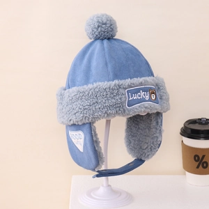 Blue winter earflap hat for kids with Lucky bear embroidery and fuzzy pompom