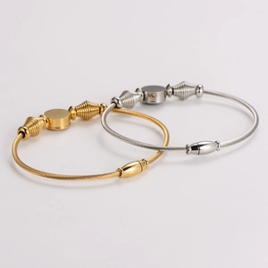 Spiral twisted wire steel bangles in gold and silver finish with flower magnetic clasp