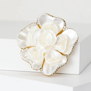 Elegant white camellia flower brooch with gold plating and sparkling rhinestones