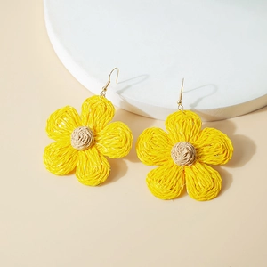 Handwoven yellow raffia flower earrings with bohemian style and metal hooks