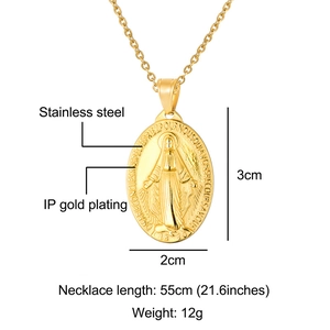 Detailed view of an IP gold plated oval saint medal necklace with precise measurements