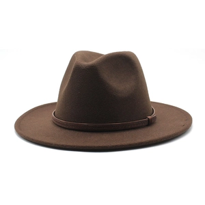 Detail shot of the dark brown wool fedora with a textured leather braided band decoration