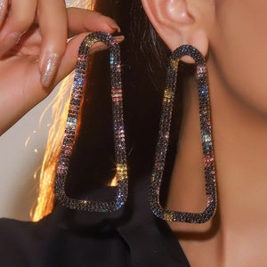 Exquisite black long fringe earrings with colorful rhinestones on a female model