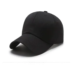 Macro side view of black cotton baseball cap featuring white 'tmi' letter embroidery