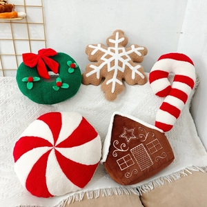 Christmas plush pillow collection featuring wreath gingerbread house and candy cane shapes