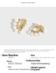 Detail view of S925 silver hoop earrings with white pearls, size 17.3mm by 15mm