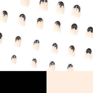 Star and moon pattern press-on nails with nude pink and black gradient design