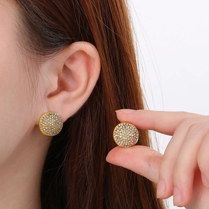 Close-up of 18K gold-plated stainless steel hoop earrings with sparkling pave-set crystals