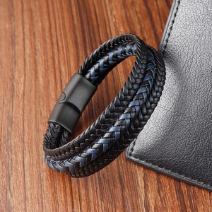 Mens woven leather bracelet with black and dark blue stripes and magnetic buckle
