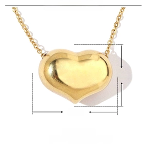 Vue détaillée d'un pendentif cœur doré de 25mm avec dimensions et poids de 4,3g inclus