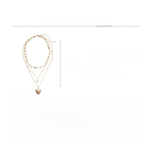 Three-layer gold necklace set featuring heart pendants and a round faux pearl drop