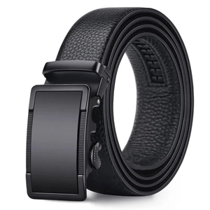 Detailed macro view of black lychee grain leather belt with a matte metal automatic buckle
