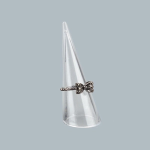 Retro bow knot ring in vintage silver finish displayed on a clear conical jewelry stand