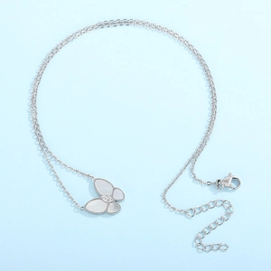Silver butterfly necklace featuring white mother-of-pearl wings and crystal accents