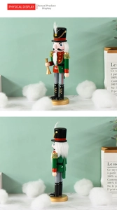 Front and side view of a 25cm wooden Nutcracker soldier with gold trumpet decor