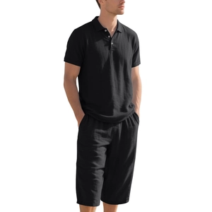 Close-up of black linen blend texture on men's polo shirt and matching shorts set