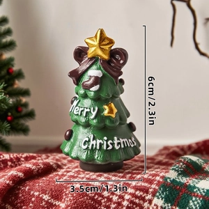 Mini resin Christmas tree figurine with red bow and Merry Christmas text on red plaid cloth