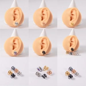 Minimalist spiral stainless steel ear cuffs in gold, silver, and black for non-pierced ears