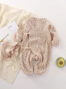 Baby girl floral romper set with matching sun hat, made of breathable cotton gauze