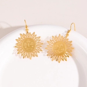 Bohemian gold sun face dangle earrings featuring hollow carved sunflower design