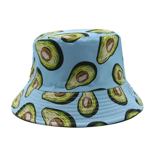 Detail of blue bucket hat with avocado print and reinforced stitching on the brim