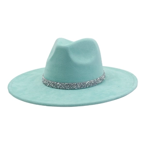 Detail of teal faux suede fedora featuring a sparkling silver rhinestone hat band