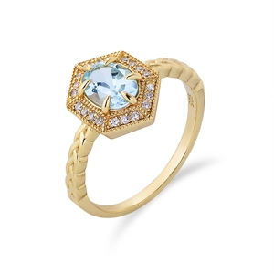 Close-up of S925 silver gold-plated ring with blue topaz and hexagon halo setting