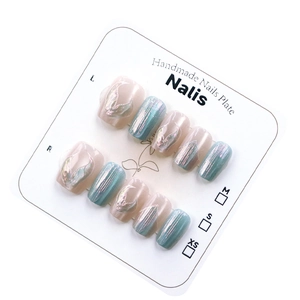 Cat eye mermaid tail press-on nails in pink and green with 3D embossed relief art