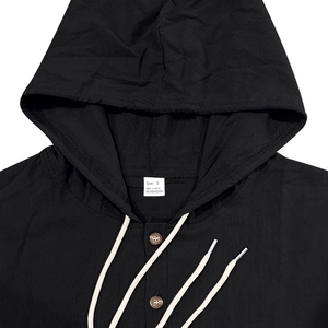 Detail of hood and neckline on black linen blend long sleeve hooded shirt for men